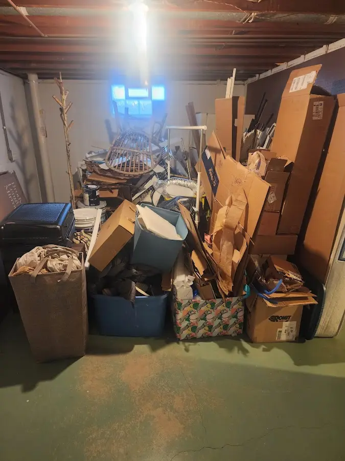 Roll-off dumpster container at job site for 2 Yard Dumpster Rental in West Melbourne